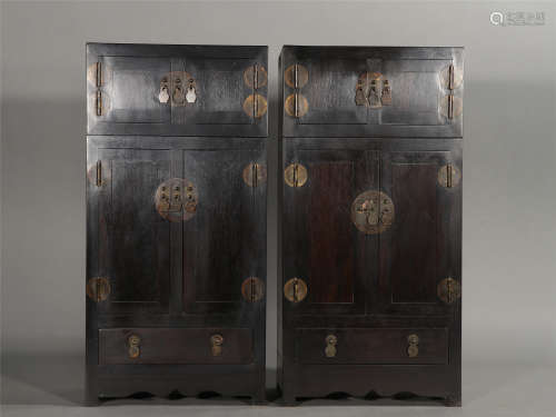 A PAIR OF CHINESE HUANGHUALI WOOD CABINETS