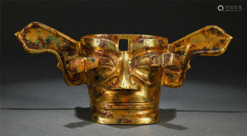 A CHINESE GILT BRONZE FACE MASK