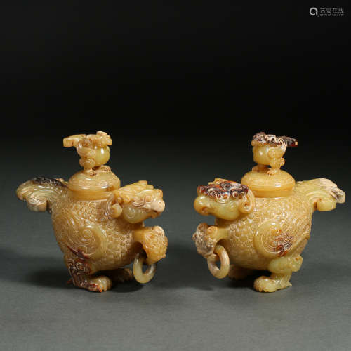 A pair of Chinese Han Dynasty animal-shaped jars