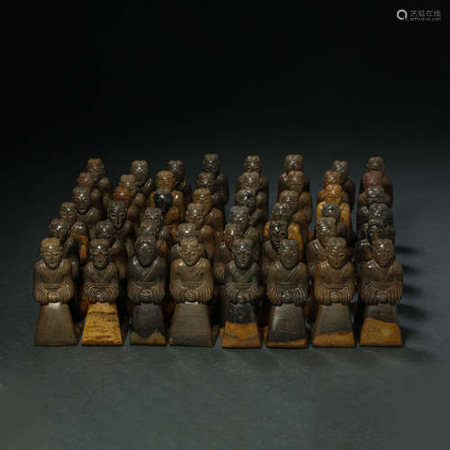 A SET OF JADE FIGURINES , EASTERN HAN DYNASTY