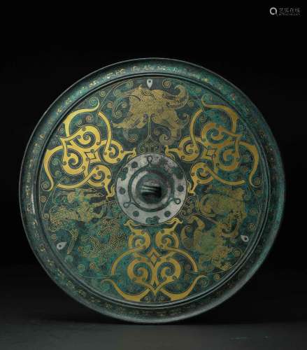 WARRING STATES PERIOD, THE BRONZE MIRROR INLAID WITH GOLD AN...