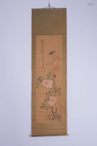 A CHINESE SCROLL PAINTING OF FLOWERS AND BIRD