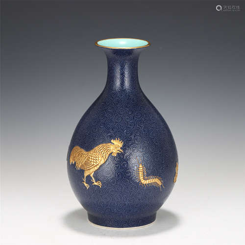 A CHINESE BLUE GLAZED ROOSTER AND INSECT PORCELAIN VASE