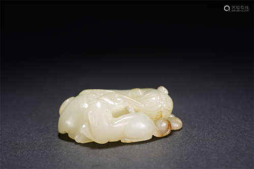 A CHINESE WHITE JADE MYTHICAL BEAST PAPERWEIGHT