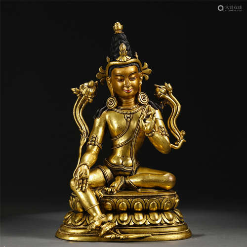 A CHINESE GILT BRONZE SEATED FIGURE OF BUDDHA