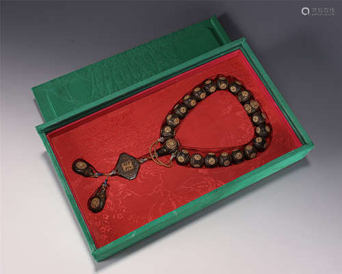 A CHINESE SILVER INLAID CHENXIANG WOOD PRAYER BEADS