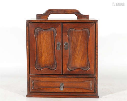 A CHINESE HUANGHUALI WOOD BOOK CABINET