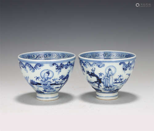 A PAIR OF CHINESE BLUE AND WHITE FIGURAL PORCELAIN CUPS