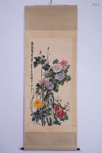 A CHINESE SCROLL PAINTING OF PEONIES