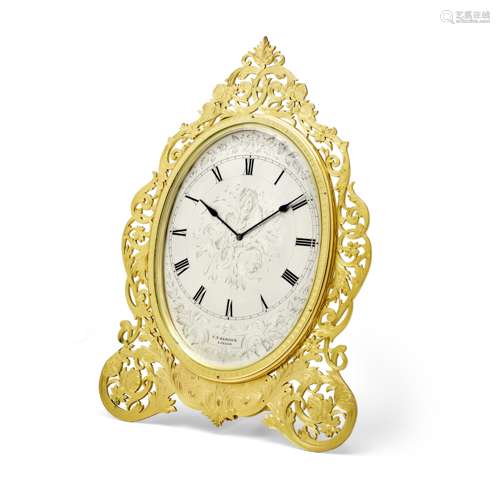 A FINE AND RARE ENGRAVED GILT BRASS OVAL STRUT TIMEPIECE OF ...