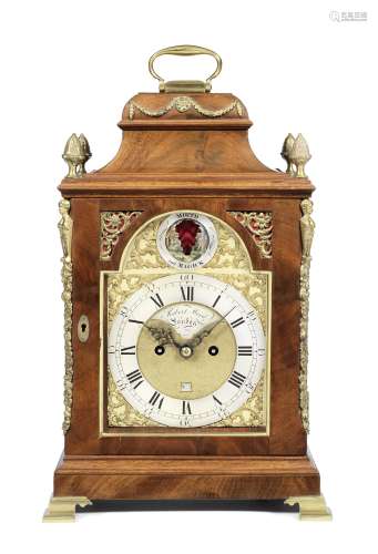 'Mirth and Magick' A mahogany and brass mounted table clock ...