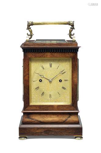 A rare early 19th century rosewood travel clock with soft/lo...