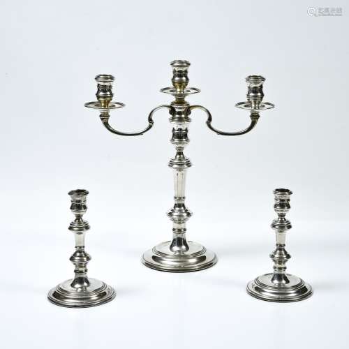 A chandelier and two candlesticks RICHARD COMYNS English sil...