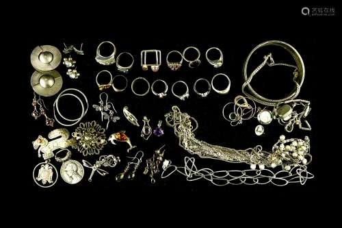 Large lot of silver jewellery Includes two bracelets, thirte...