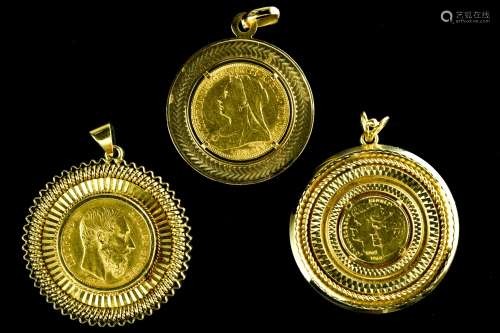 Set of three pendants set with coins 18 kt gold pendants and...