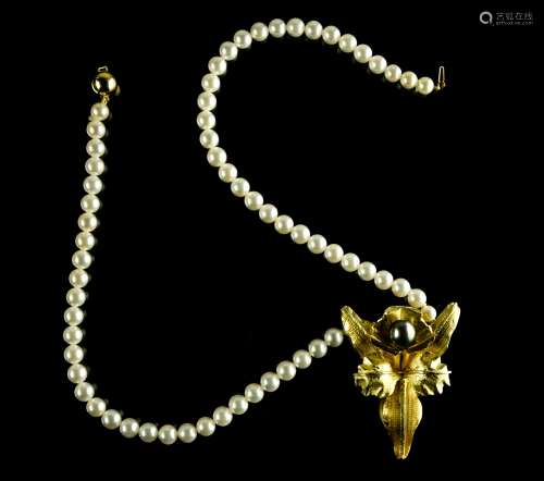 Orchid necklace Composed of a string of cultured pearls on a...