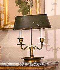 Lampe bouillotte à deux lumières en bronze doré à base cuvet...