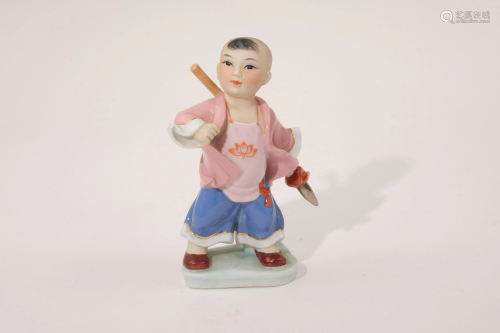 A 20th Centry Porcelain Figure of Boy Child