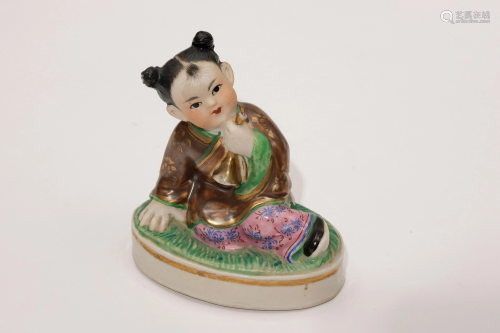 A 20th Centry Porcelain Figure of Girl Child