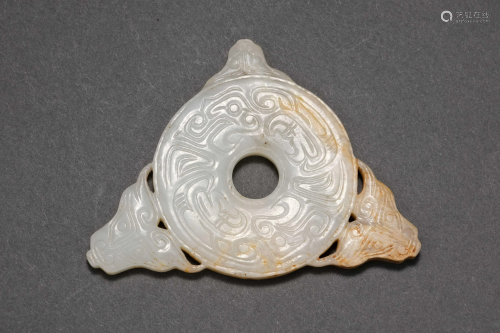 A Carved Jade Ox Pendant