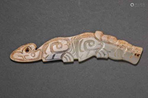A Carved Jade Dragon Pendant