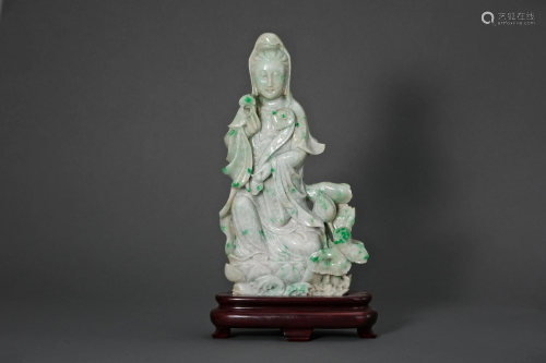 A Carved Jadeite Figure of Guanyin