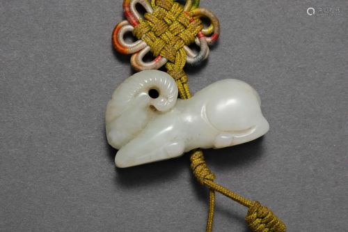 A Carved Goat Pendant