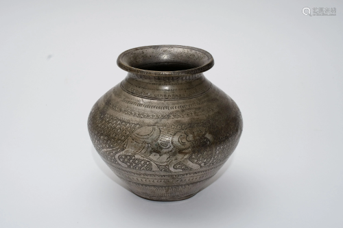 An 18th Century Tibetan Carved Bronze Offering Jar