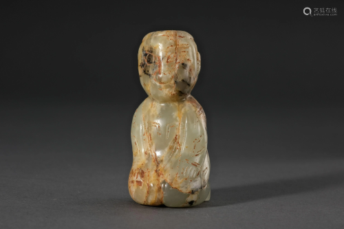 A Carved Jade Child Pendant