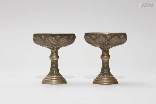 A Pair of 19th Century Tibetan White Copper Offering