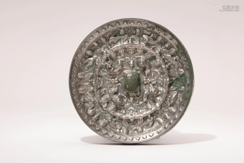 A Bronze Mirror with Sea Creatures and Grapes