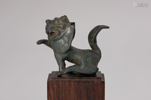 A 13th Century Gilt Bronze Figure of Lion