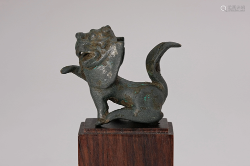 A 13th Century Gilt Bronze Figure of Lion