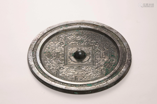 A Formal Bronze Mirror