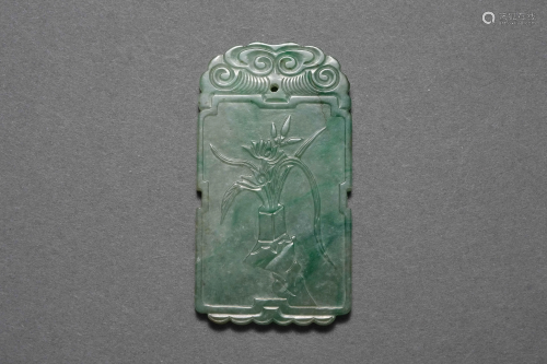 A Carved Jadeite Plaque