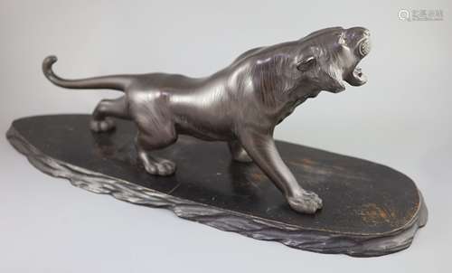 A large Japanese bronze figure of a tiger, Meiji periodnatur...