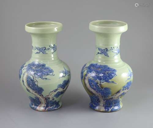 A pair of Chinese underglaze blue and copper red celadon gro...