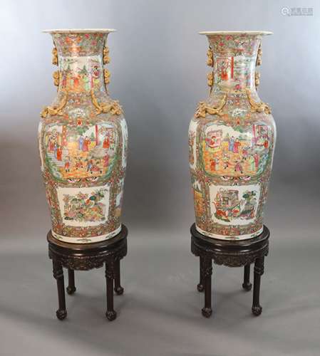 * A pair of massive Chinese Canton style famille rose vases,...