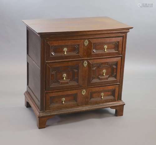 A William & Mary oak chest,with moulded rectangular top over...