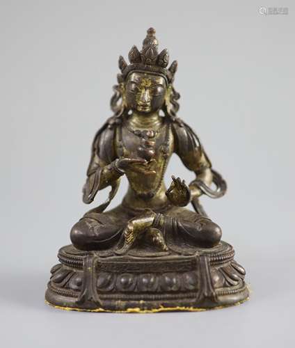 A Chinese gilt bronze figure of Amitayus, Qianlong mark and ...