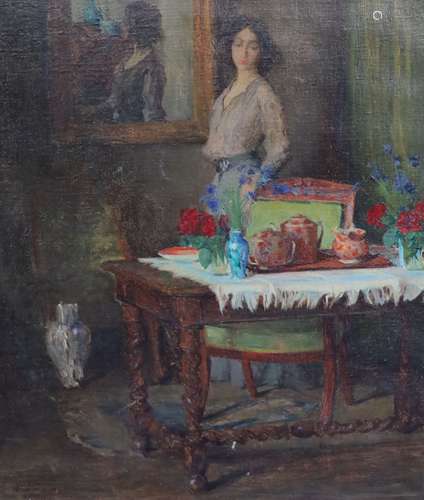 Frank Spenlove Spenlove (1868-1933)Interior with woman stand...