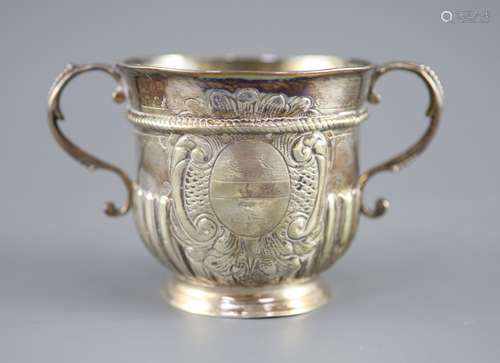 A Queen Anne demi-spiral fluted silver porringer,with S-scro...