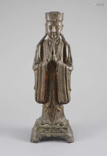 A Chinese bronze standing figure of an immortal, late Ming, ...