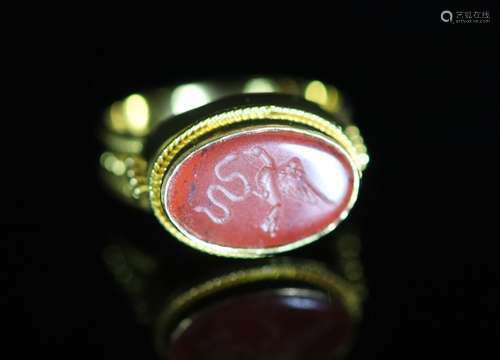 A Venetian 22ct gold and antique oval carnelian set signet r...