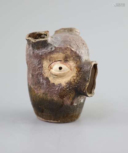 An unusual Martin Bros stoneware grotesque bulb pot, dated 1...