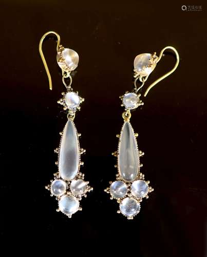 A pair of early 20th century gold and six stone cabochon moo...