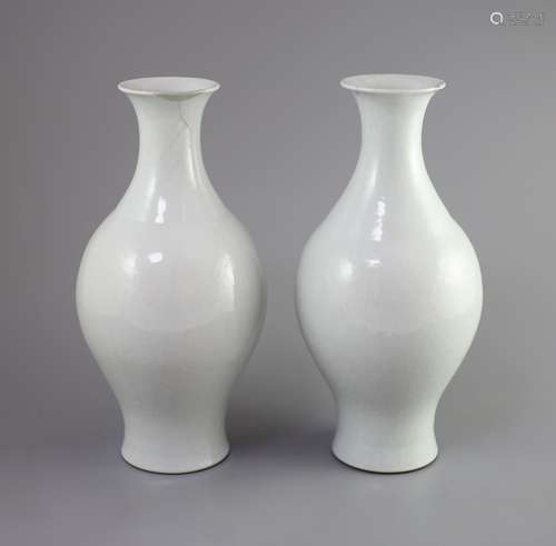 A pair of Chinese Guan-type vases, ganlan, Qianlong seal mar...