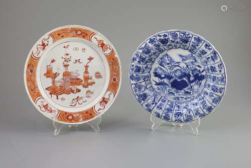 A Chinese blue and white dish and a rouge de fer plate, both...