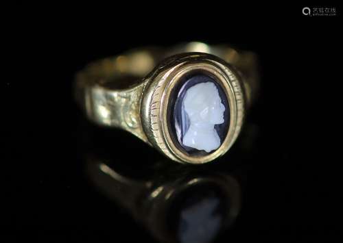 An early 19th century gold and cameo set poison ring,the hin...