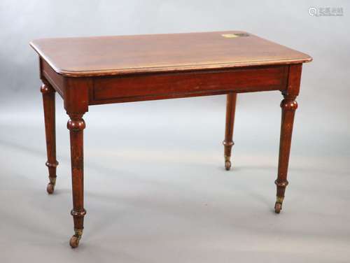 A Victorian mahogany writing table,with rounded rectangular ...